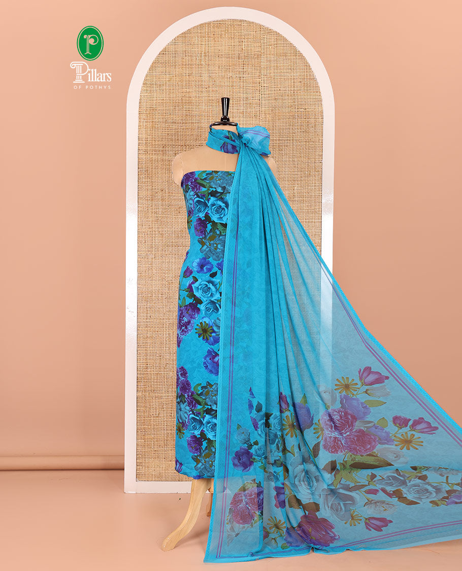 Rama green material chudidar set, realistic floral-printed Italian crepe top, a plain bottom, and a floral-printed georgette dupatta