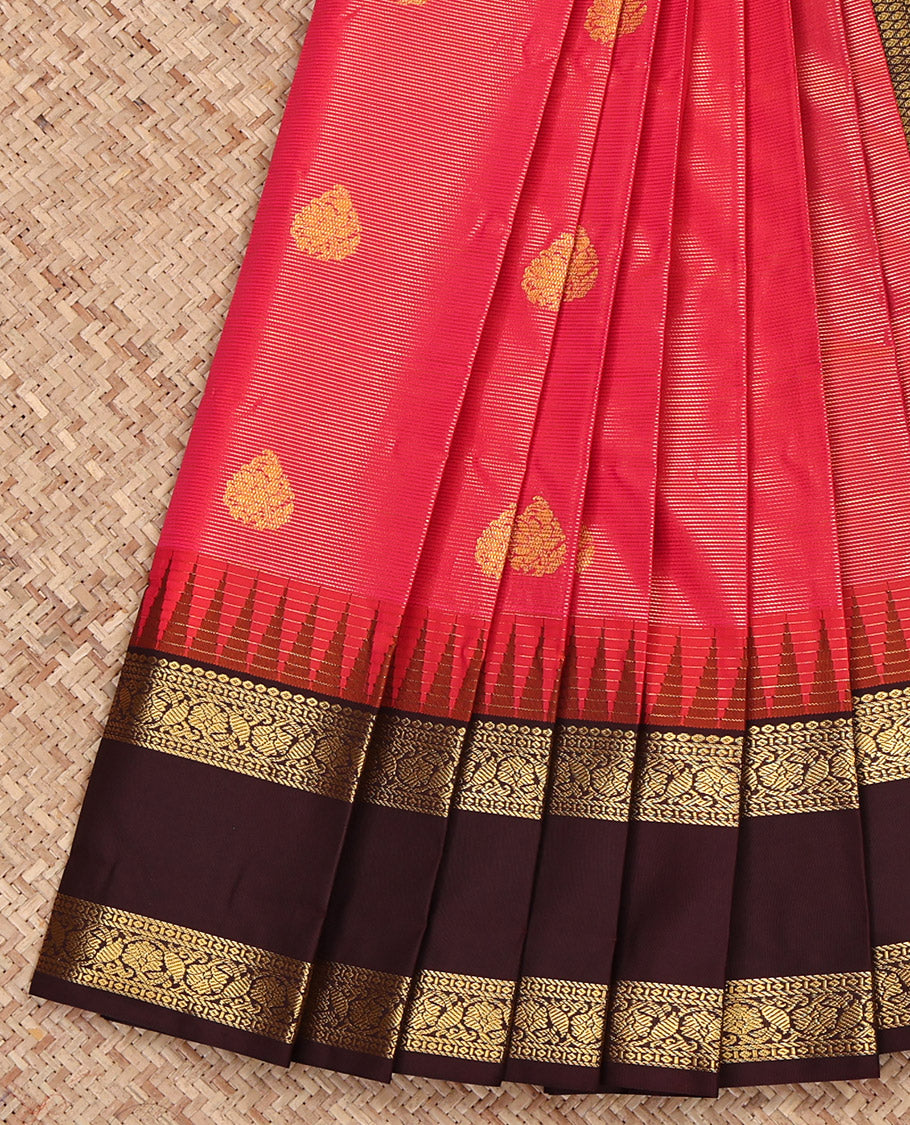 Pink Budget Silk Saree, Grandly Sparkled with Zari Buttas and Stripes on Its Body, Complemented by a Contrast Traditional Zari Design Rettai Pettu Temple Border, Jaal Pallu, and Paired with a Contrast Blouse