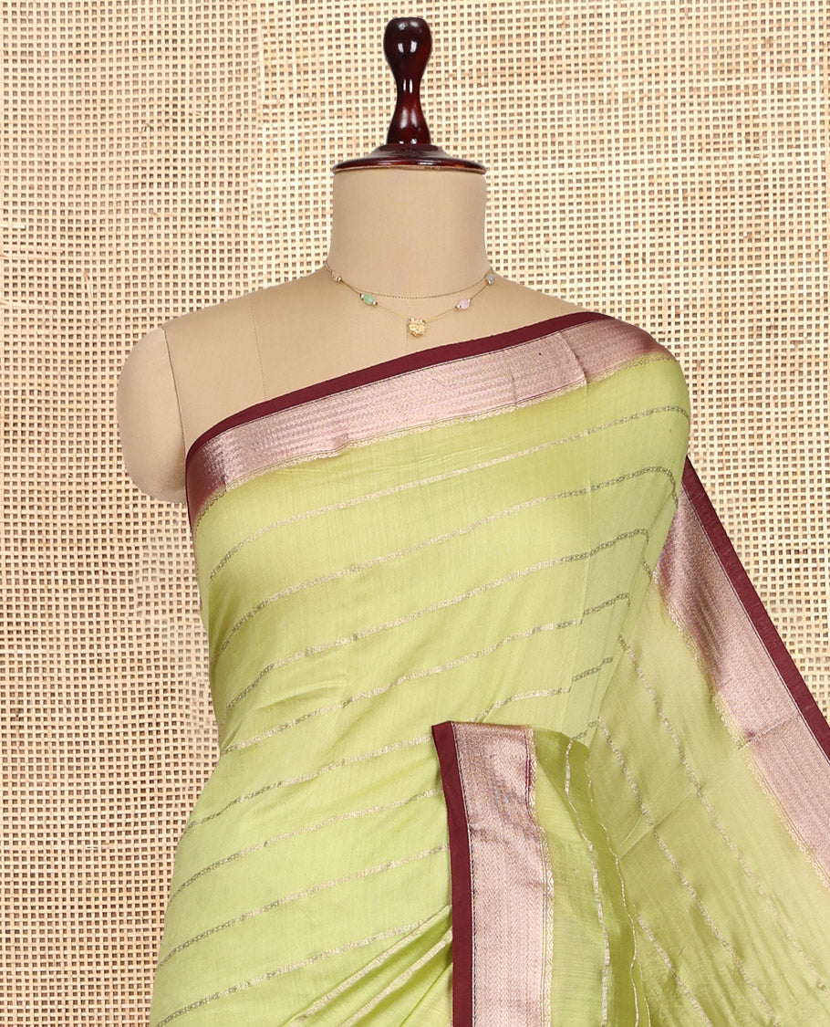 Green Assam Silk Saree, Enriched with Zari Stripes, Complemented by Contrast Zari Border, Zari Woven Pallu, and Contrast Blouse