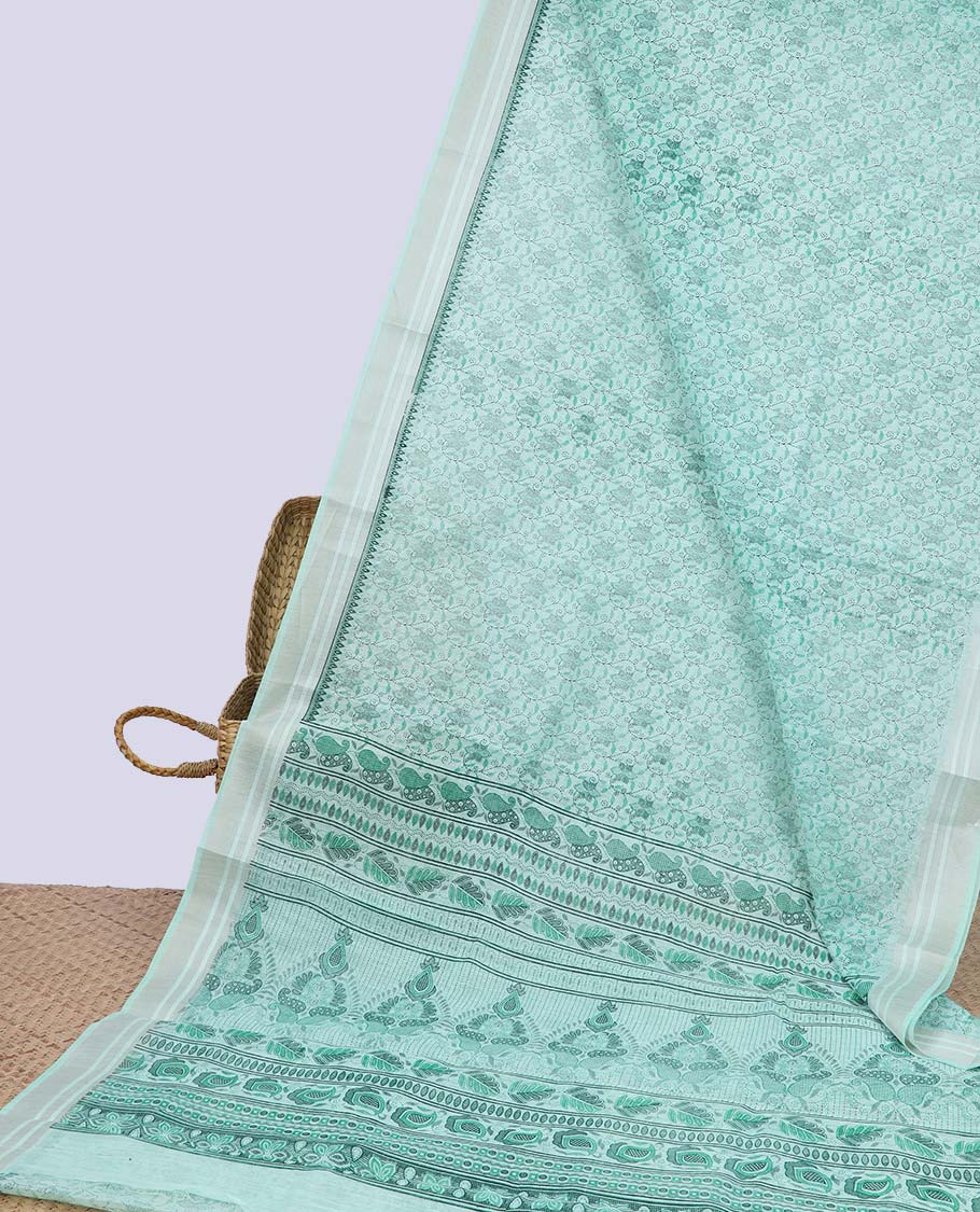 Green intricately printed budget cotton saree, plain border & intricately printed pallu