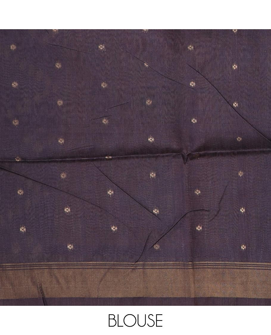 Grey zari buttas and elephant motifs tussar silk saree, contrast bavanji border, and patola style elephant motifs printed pallu