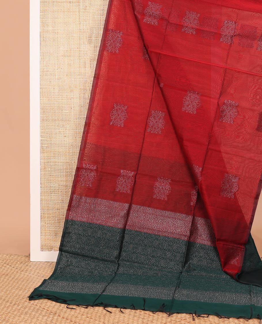 Borderless red zari buttas semi-silk cotton saree, contrast intricate pallu