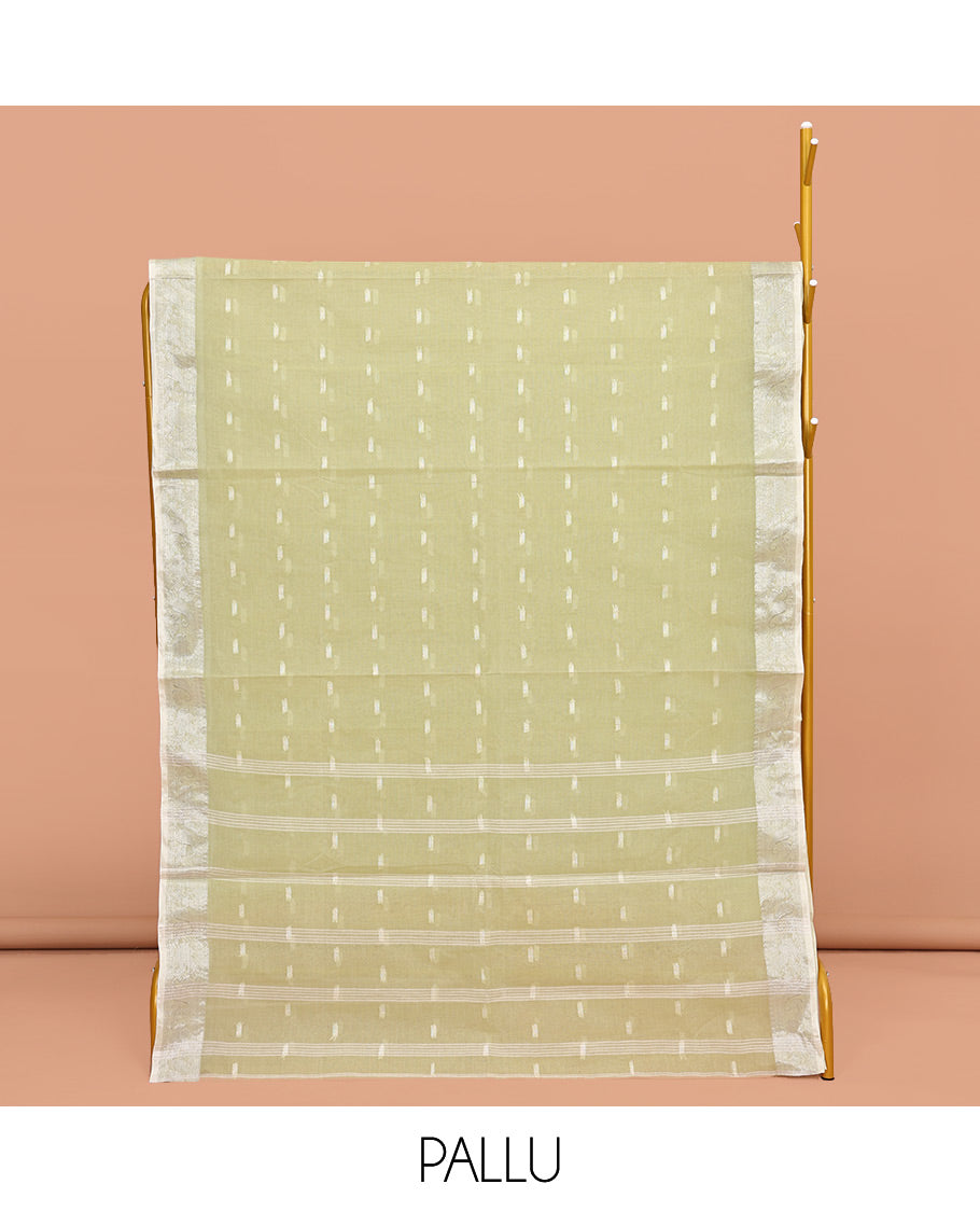 Pale Green Bengal Cotton Saree, Subtly Sparkled with Buttas All Over Its Body, Complemented by a Contrast Paisley Zari Design Border, Pallu of Stripes, and Paired with a Matching Blouse