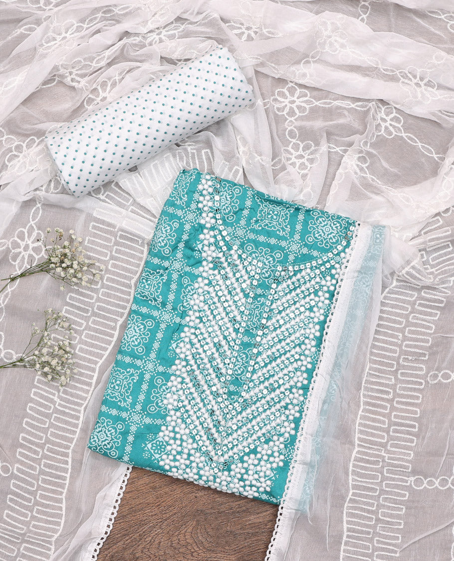 Blue Material Chudidar Set, Elevated with Intricately Printed and Neck Embroidery on Rayon Top, a Contrast Polka Dot Printed Bottom, and Paired with Embroidered Chiffon Dupatta
