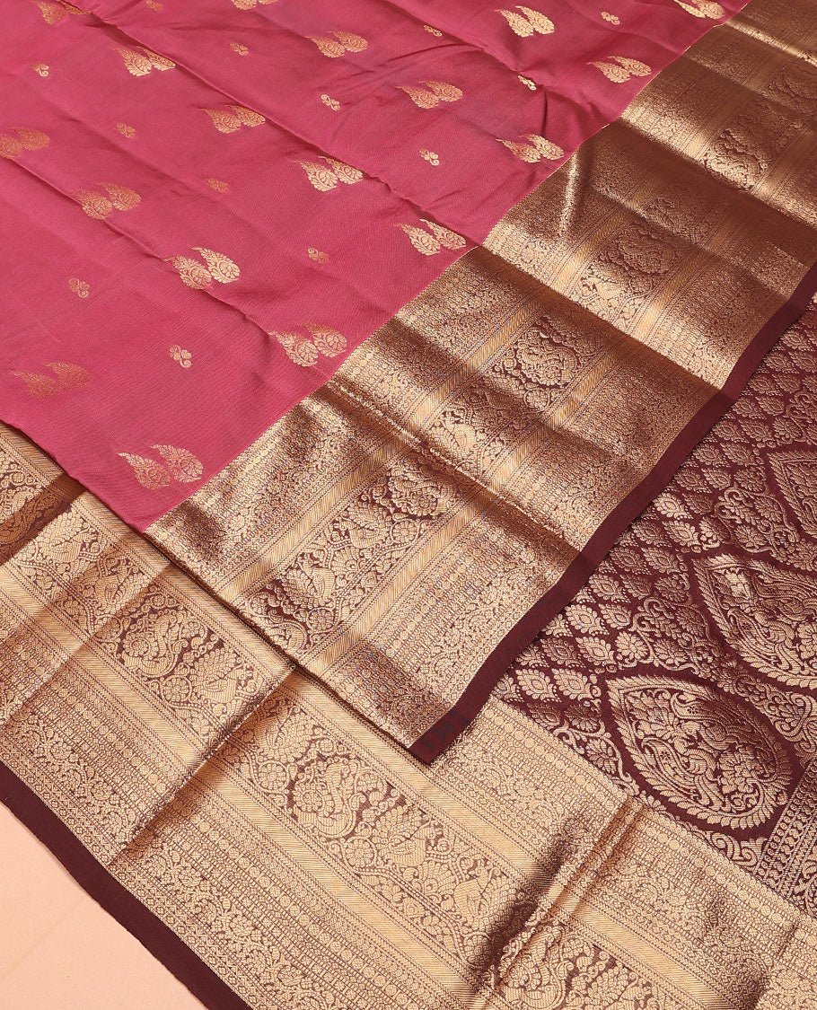 Pink zari buttas Vasundhara silk mix saree, contrast border of manga mokku, muthu, poun, kodi visiry, mayil, and star designs, and intricately zari woven pallu