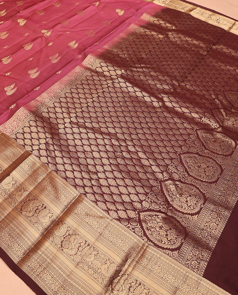 Pink zari buttas Vasundhara silk mix saree, contrast border of manga mokku, muthu, poun, kodi visiry, mayil, and star designs, and intricately zari woven pallu