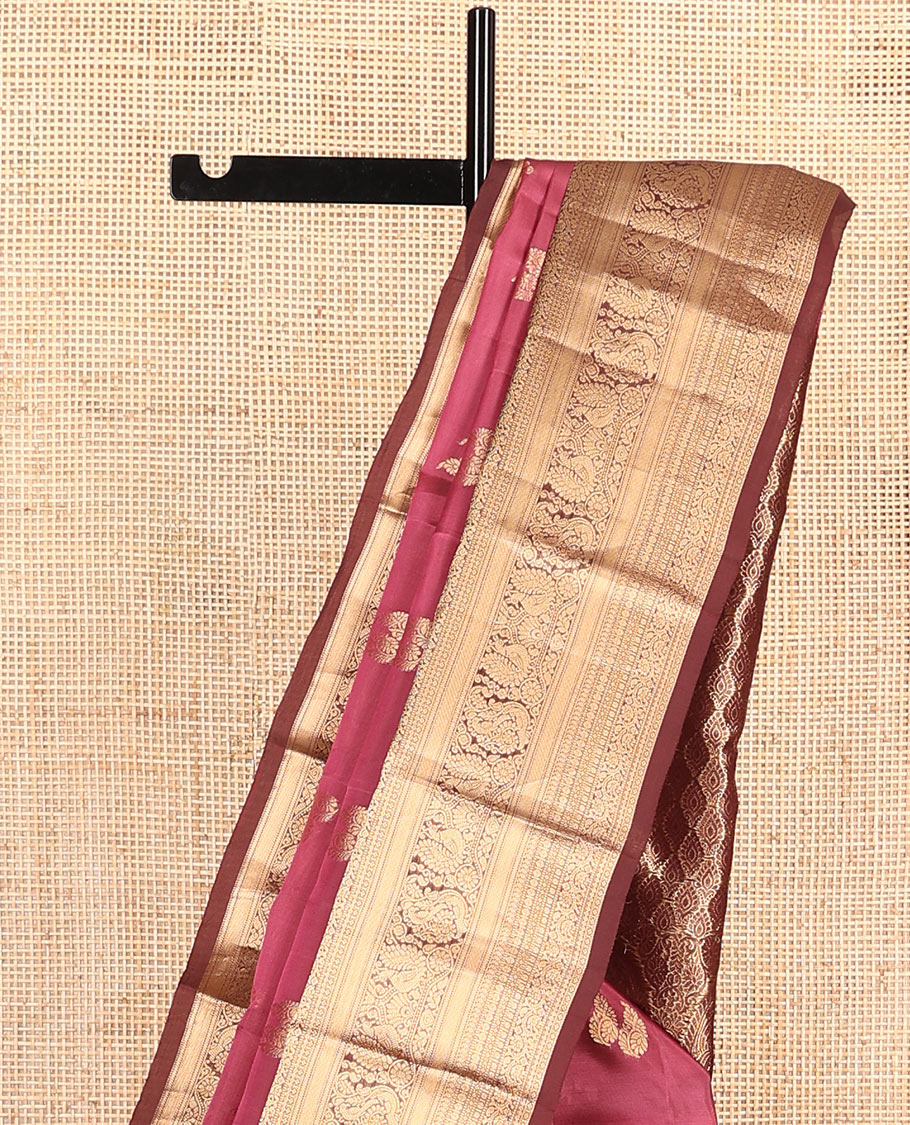 Pink zari buttas Vasundhara silk mix saree, contrast border of manga mokku, muthu, poun, kodi visiry, mayil, and star designs, and intricately zari woven pallu