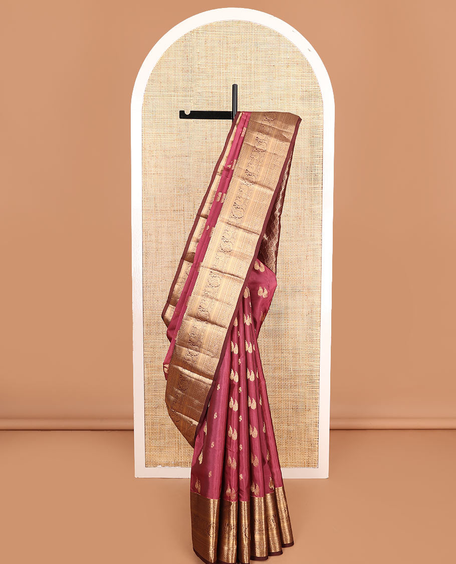 Pink zari buttas Vasundhara silk mix saree, contrast border of manga mokku, muthu, poun, kodi visiry, mayil, and star designs, and intricately zari woven pallu