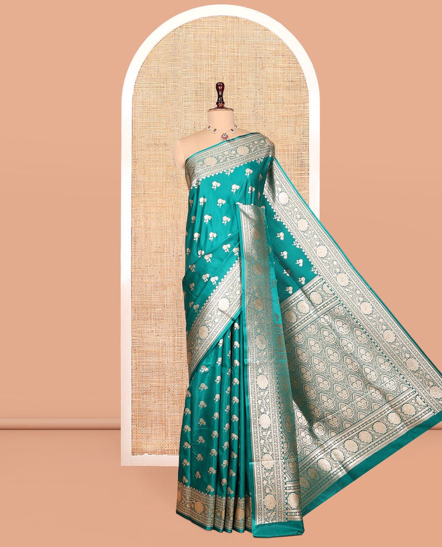 Green Banarasi Nylon Saree, Bedecked with Buttas, Floral Creeper Zari Border, Intricate Pallu, and a Matching Blouse
