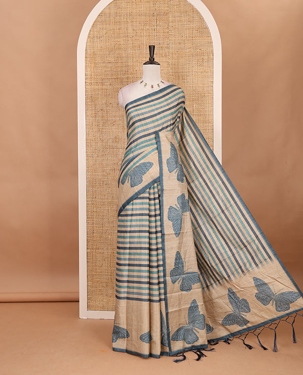 Blue horizontal stripes printed soft tussar saree adorned with big butterfly motifs printed border and pallu, contrast blouse