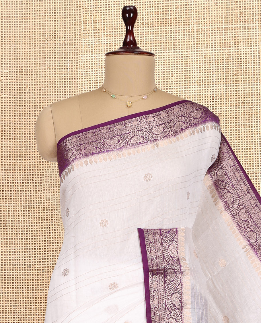 White Assam Silk Saree, Detailed with Zari Buttas and Stripes, Complemented by Contrast Floral Creeper Zari Border, Zari Woven Pallu, and Contrast Blouse