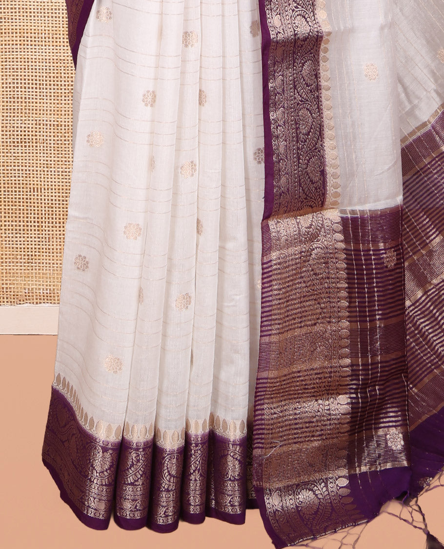 White Assam Silk Saree, Detailed with Zari Buttas and Stripes, Complemented by Contrast Floral Creeper Zari Border, Zari Woven Pallu, and Contrast Blouse