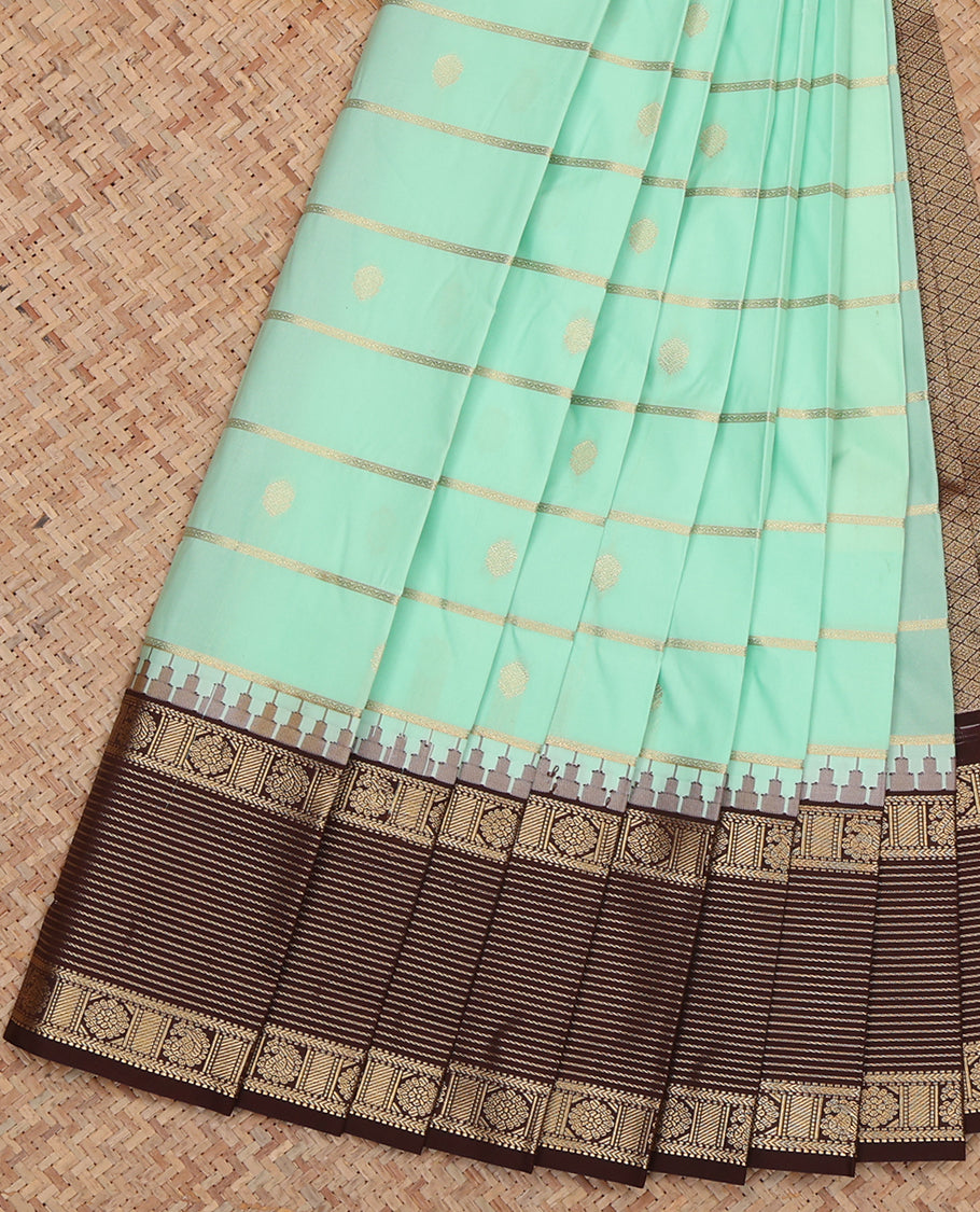 Turquoise Budget Silk Saree, Embellished with Zari Buttas and Stripes, Complemented by a Contrast Traditional Zari Border, Grand Jaal Pallu, and Contrast Blouse