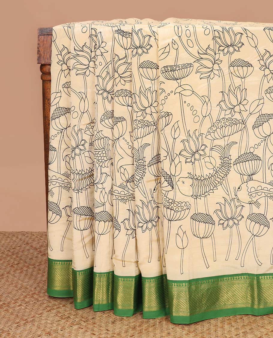 Light sandal lotus and fish motifs machine printed kalamkari cotton saree, contrast traditional zari border, and pallu of human and elephant motifs