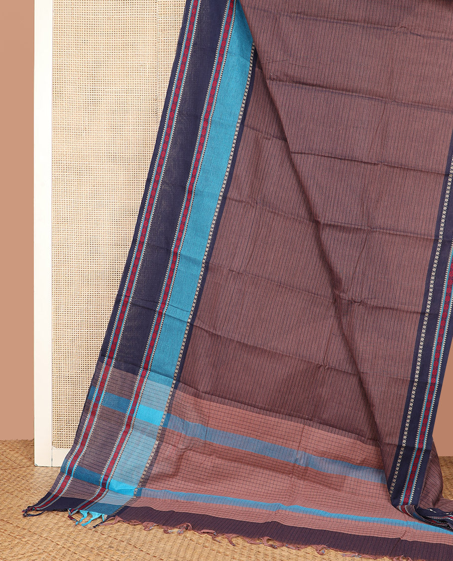 Brown Chirala Cotton Saree, Subtly Printed with Stripes All Over Its Body, Complemented by a Contrast Traditional Thread Design Border, Subtly Checked Pallu, and Paired with a Matching Blouse