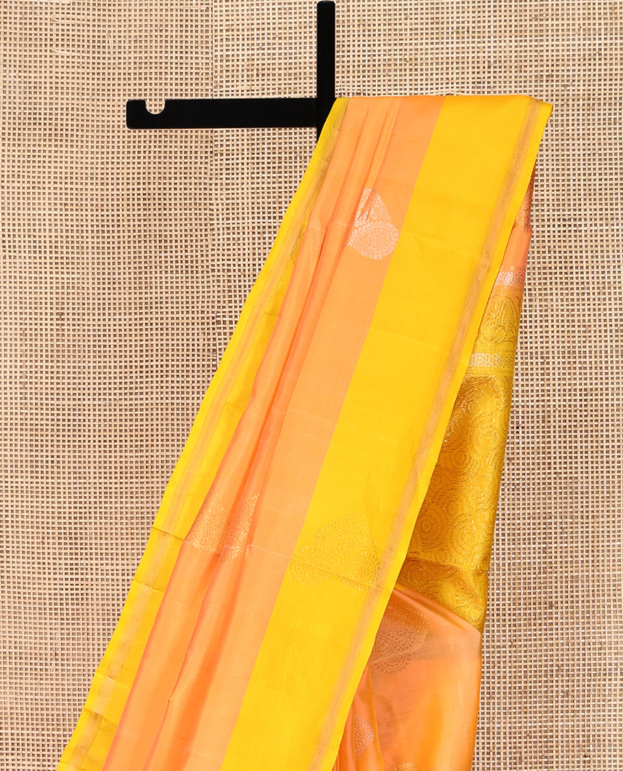 Orange Mayuri Lite Silk Mix Saree, Opulently Embellished with Buttas All Over Its Body, Complemented by a Contrast Zari Striped Border, Pallu of Spiral Designs, and Paired with a Contrast Blouse