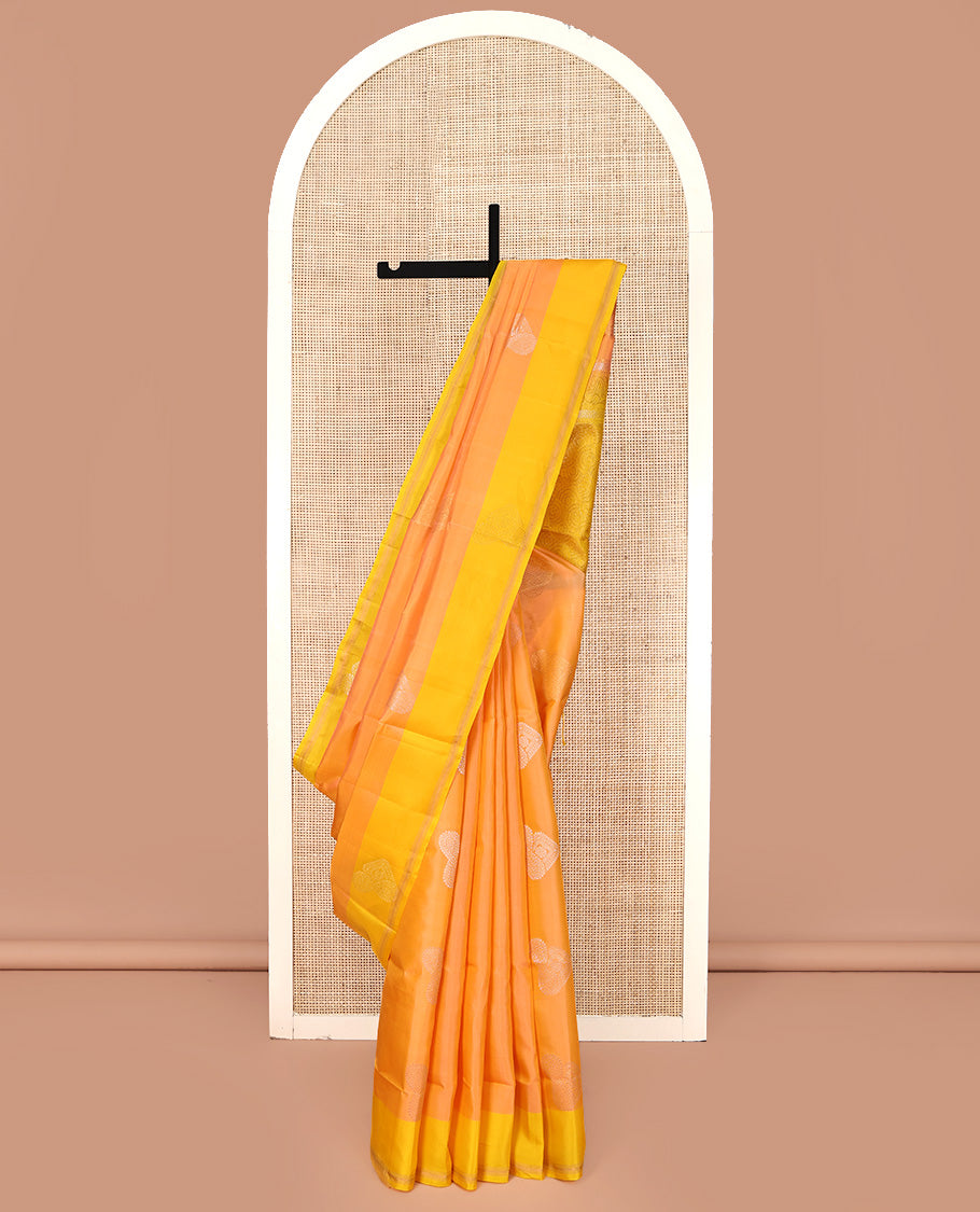Orange Mayuri Lite Silk Mix Saree, Opulently Embellished with Buttas All Over Its Body, Complemented by a Contrast Zari Striped Border, Pallu of Spiral Designs, and Paired with a Contrast Blouse