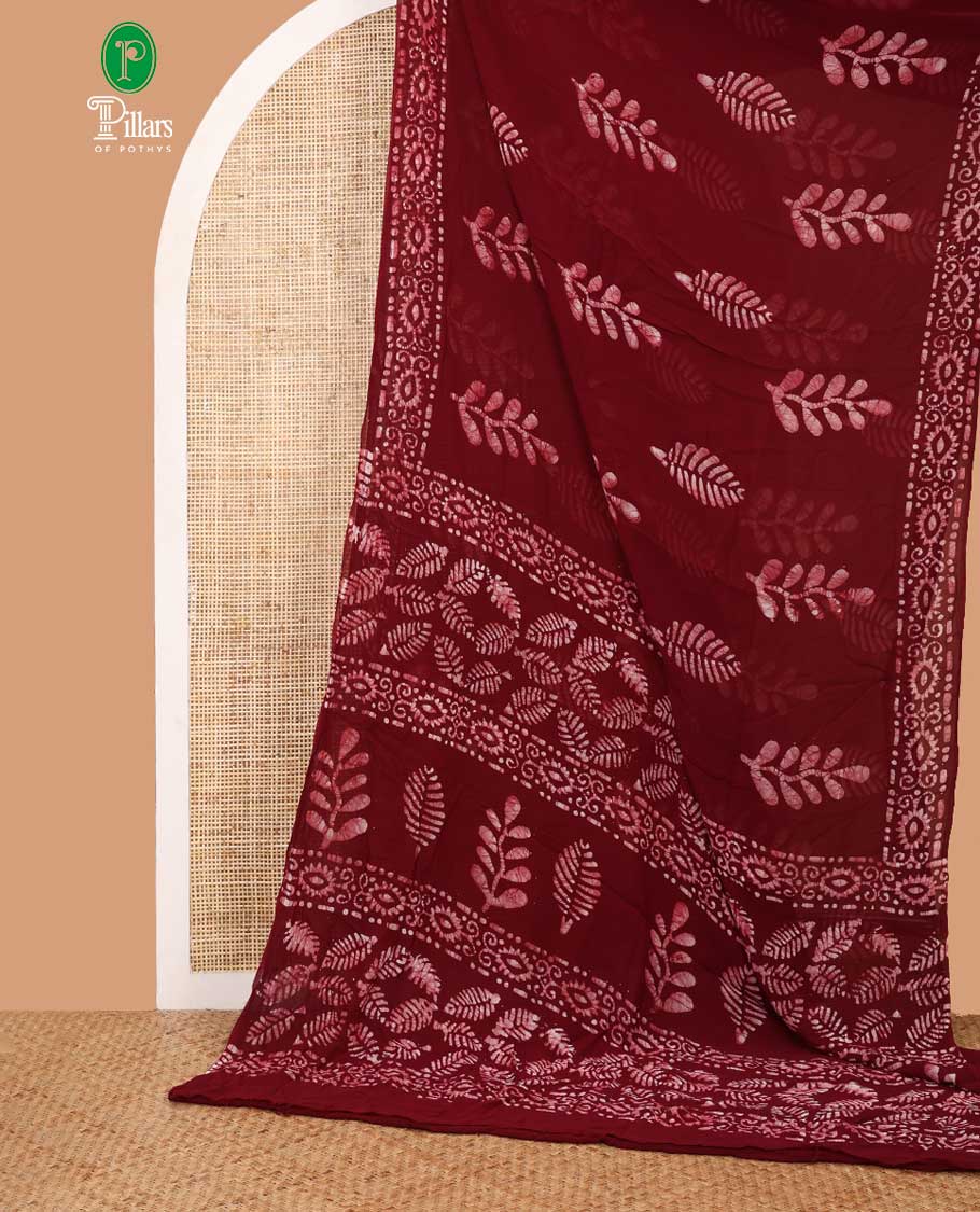 Maroon pathik printed georgette saree with pathik printed border & pathik printed pallu along with plain blouse
