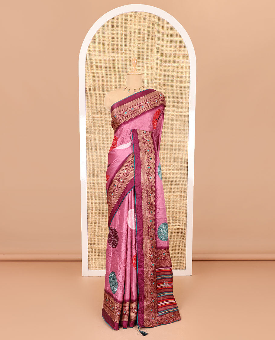 Pink bandhani printed with mirror work moss crepe saree, contrast traditional design mirror work border, printed pallu of Swarovski stone work, and a contrast plain blouse