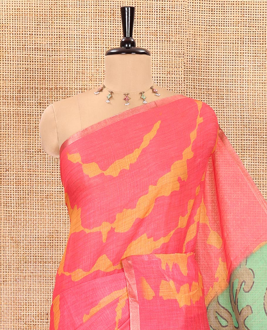 Pink shibori printed linen cotton saree, piping border, contrast floral printed pallu, and a contrast floral printed blouse