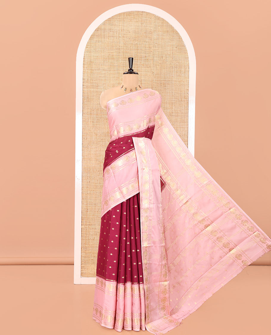 Wine Art Mysore Silk Saree, Decorated with Zari Buttas All Over Its Body, Complemented by a Contrast Rettai Pettu Border of Two-Headed Eagle Designs, Pallu Steeped with Buttas and Stripes, and Paired with a Contrast Blouse