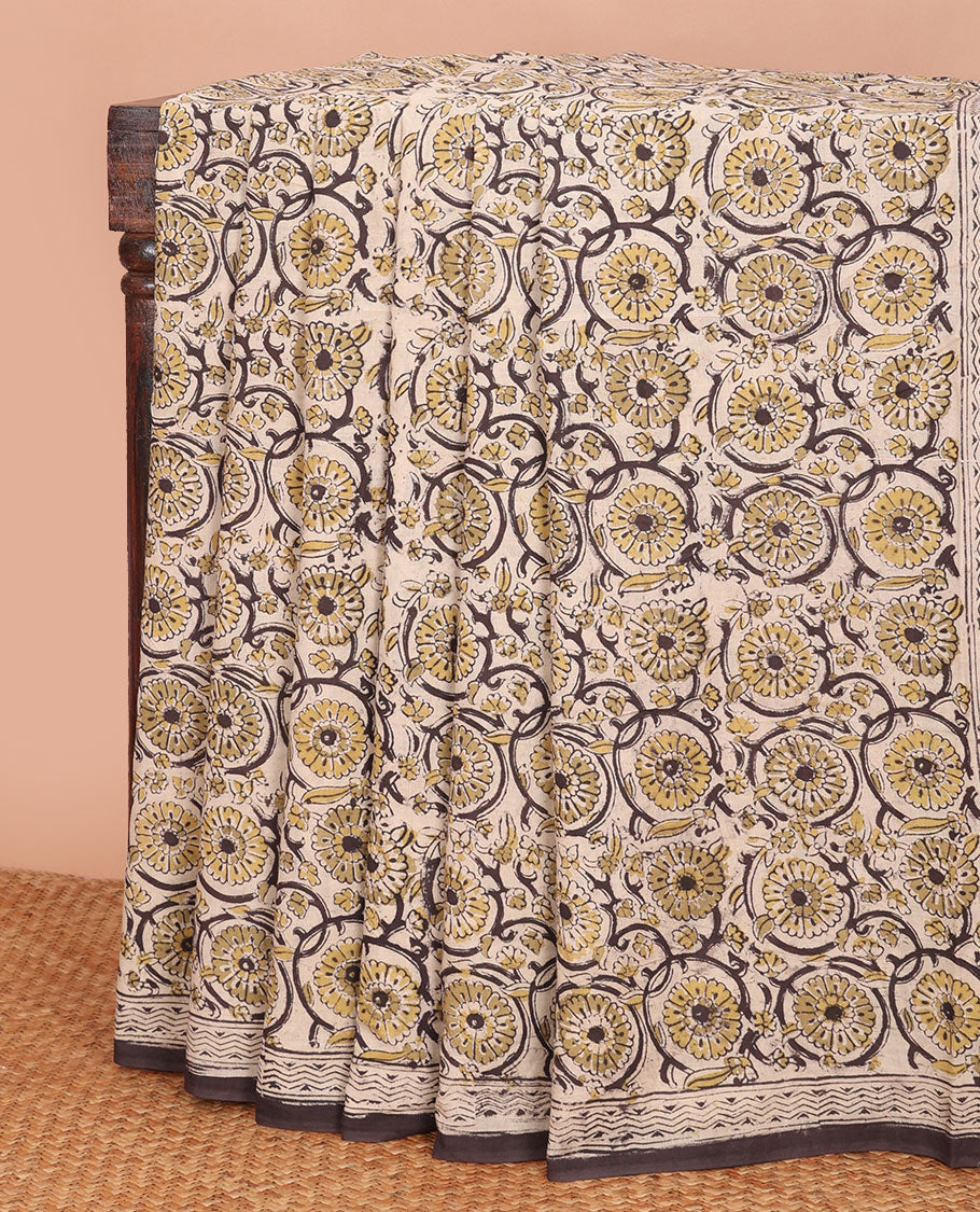 Light sandal floral vine machine-printed kalamkari cotton saree, printed border & printed pallu