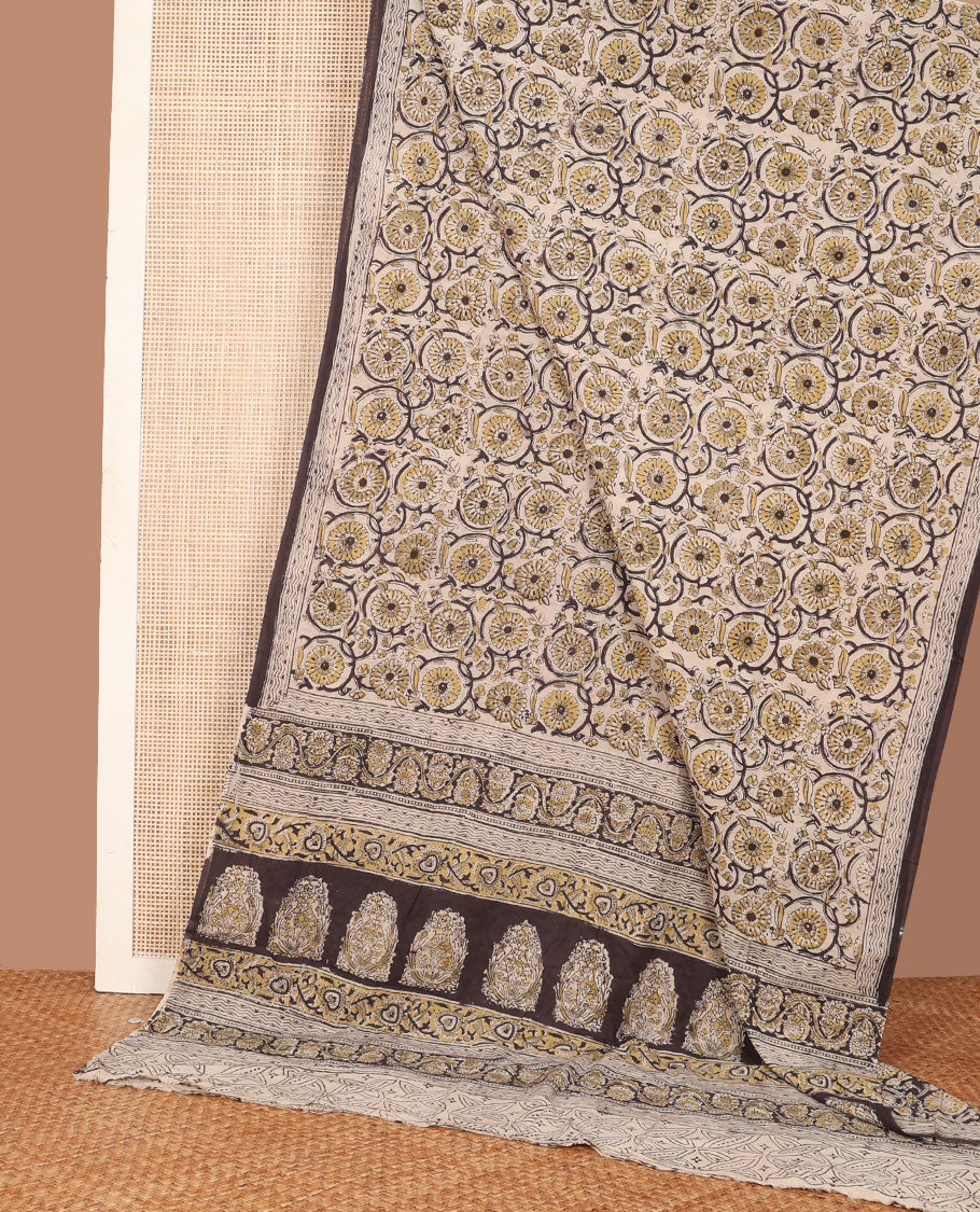 Light sandal floral vine machine-printed kalamkari cotton saree, printed border & printed pallu