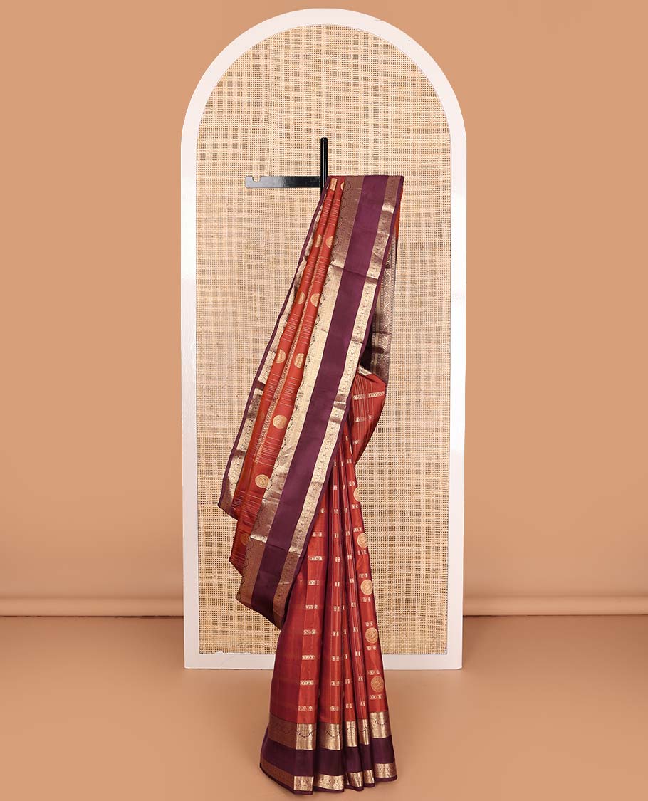 Orange zari checks and buttas Vasundhara silk mix saree, contrast rettai pettu border of rudraksham, kodi visiry and mayil designs, and scallop pallu