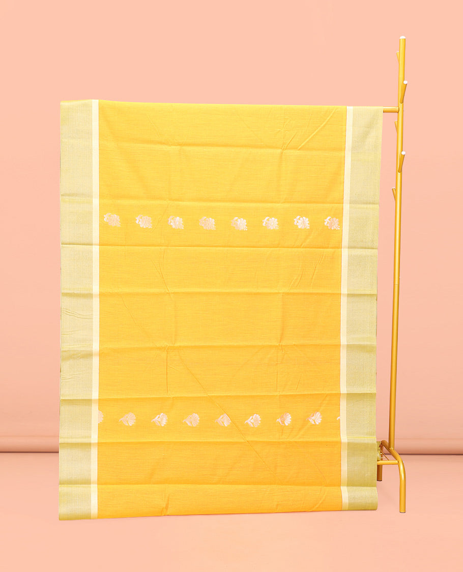 Yellow Semi-Silk Cotton Saree, Subtly Decked up with Floral Zari Buttas All Over Its Body, Complemented by Contrast Border, Pallu of Floral Designs, and Paired with a Matching Blouse