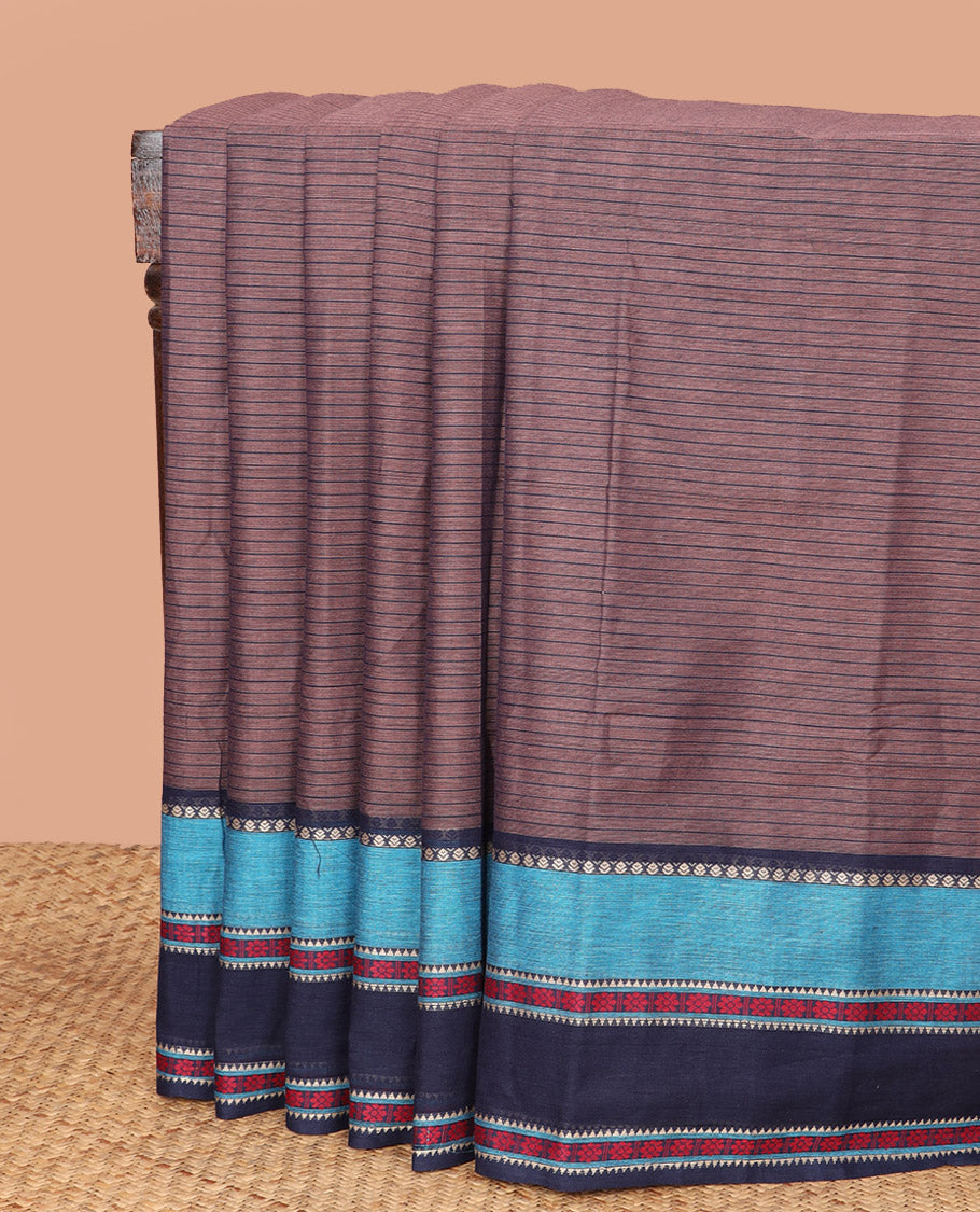 Brown Chirala Cotton Saree, Subtly Printed with Stripes All Over Its Body, Complemented by a Contrast Traditional Thread Design Border, Subtly Checked Pallu, and Paired with a Matching Blouse