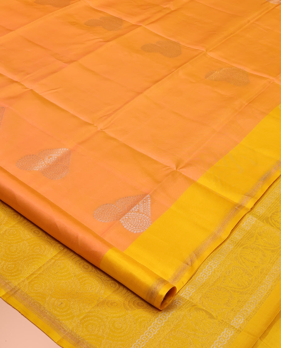 Orange Mayuri Lite Silk Mix Saree, Opulently Embellished with Buttas All Over Its Body, Complemented by a Contrast Zari Striped Border, Pallu of Spiral Designs, and Paired with a Contrast Blouse