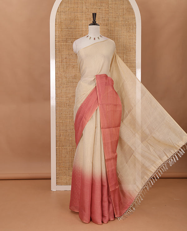 Borderless sandal-pink plain ombre-colored tissue saree, plain pallu & circle motifs printed blouse