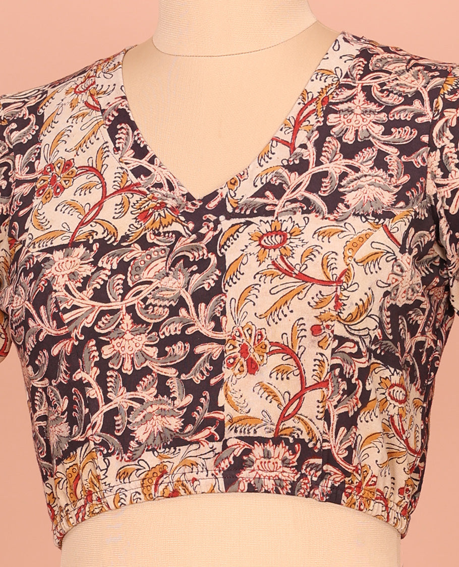 Cream Cotton Readymade Blouse Prettified with All-Over Floral Motifs Print, Front V-Neck, Back Closed Neck, and Elbow Sleeves