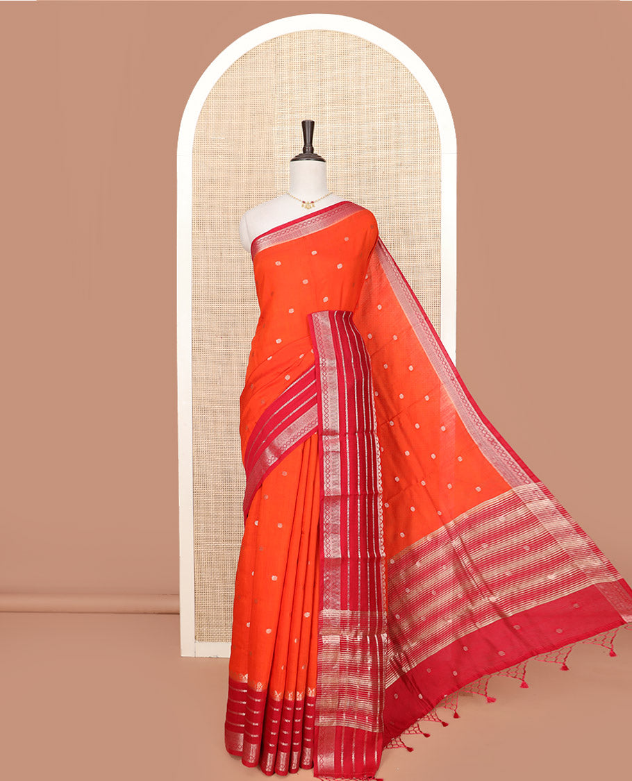 Orange Assam Silk Saree Gleamed Up with Floral Zari Buttas, Complemented by a Contrast Traditional Zari Border, a Captivating Pallu of Zari Designs, and Paired with a Contrast Blouse