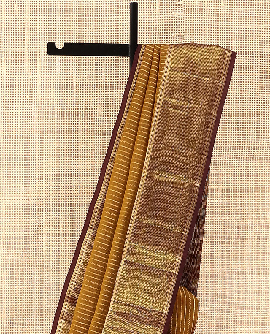 Mustard Vasundhara Lite Silk Mix Saree, Prettified with Neli, Muthu, and Banaras Buttas, Complemented by a Contrast Border of Muthu Designs, Grandly Woven Jaal Design Pallu, and Paired with a Contrast Blouse