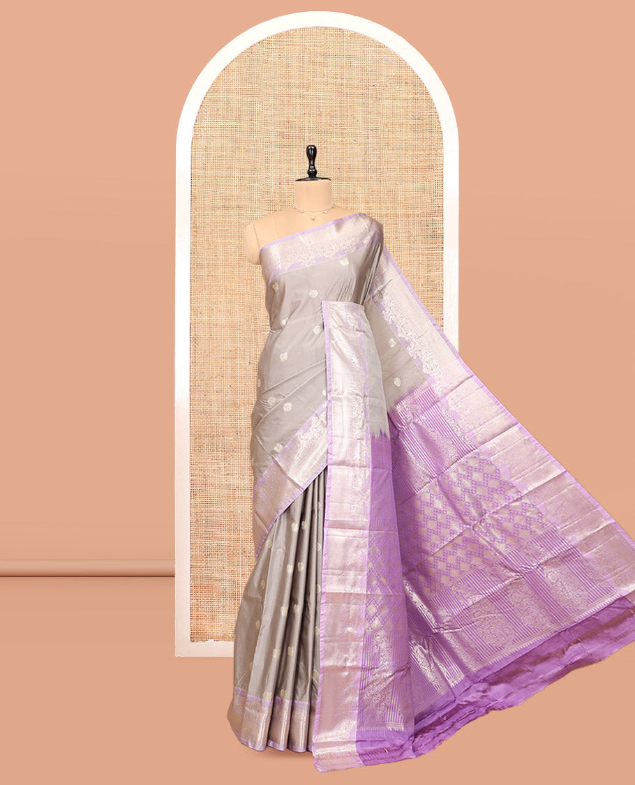 Grey Budget Silk Saree, Sparsely Threaded with Peacock-Chakram Buttas, Complemented by Contrast Traditional Zari Border, Pallu of Jaal and Paisleys, and Contrast Blouse