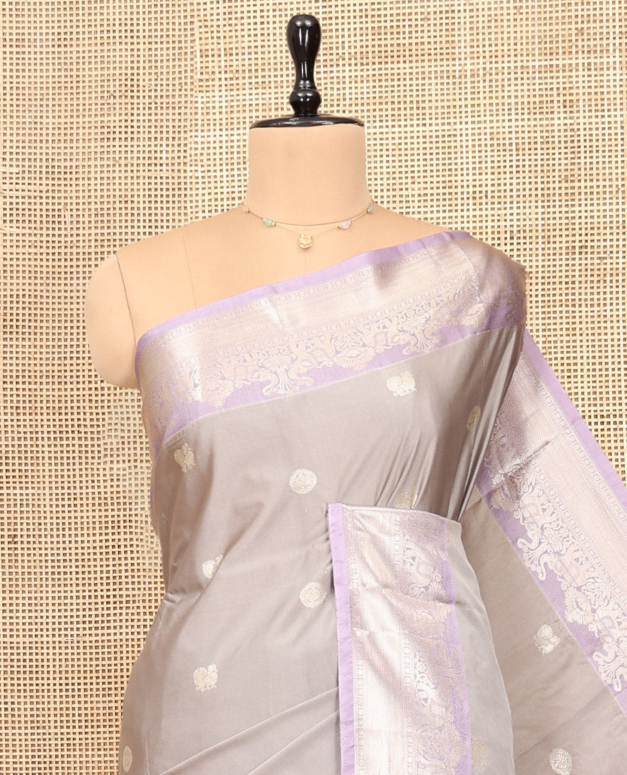 Grey Budget Silk Saree, Sparsely Threaded with Peacock-Chakram Buttas, Complemented by Contrast Traditional Zari Border, Pallu of Jaal and Paisleys, and Contrast Blouse