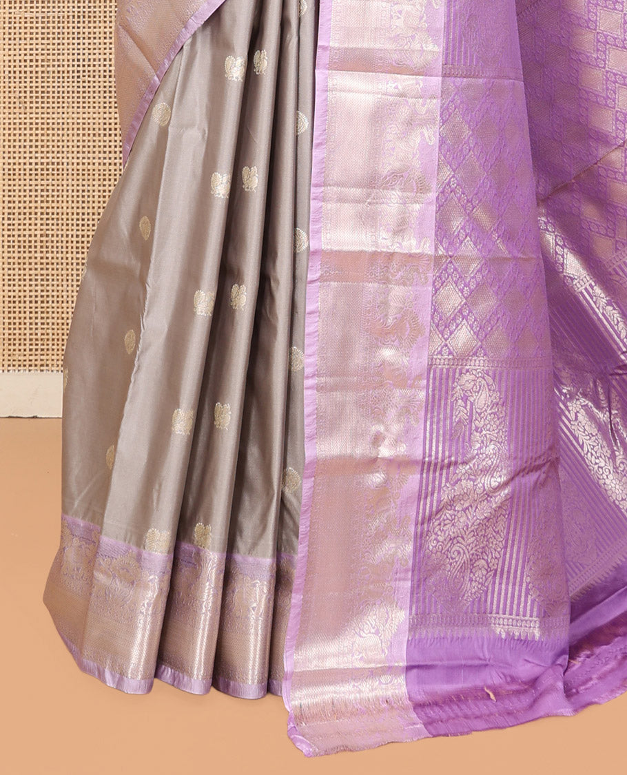 Grey Budget Silk Saree, Sparsely Threaded with Peacock-Chakram Buttas, Complemented by Contrast Traditional Zari Border, Pallu of Jaal and Paisleys, and Contrast Blouse
