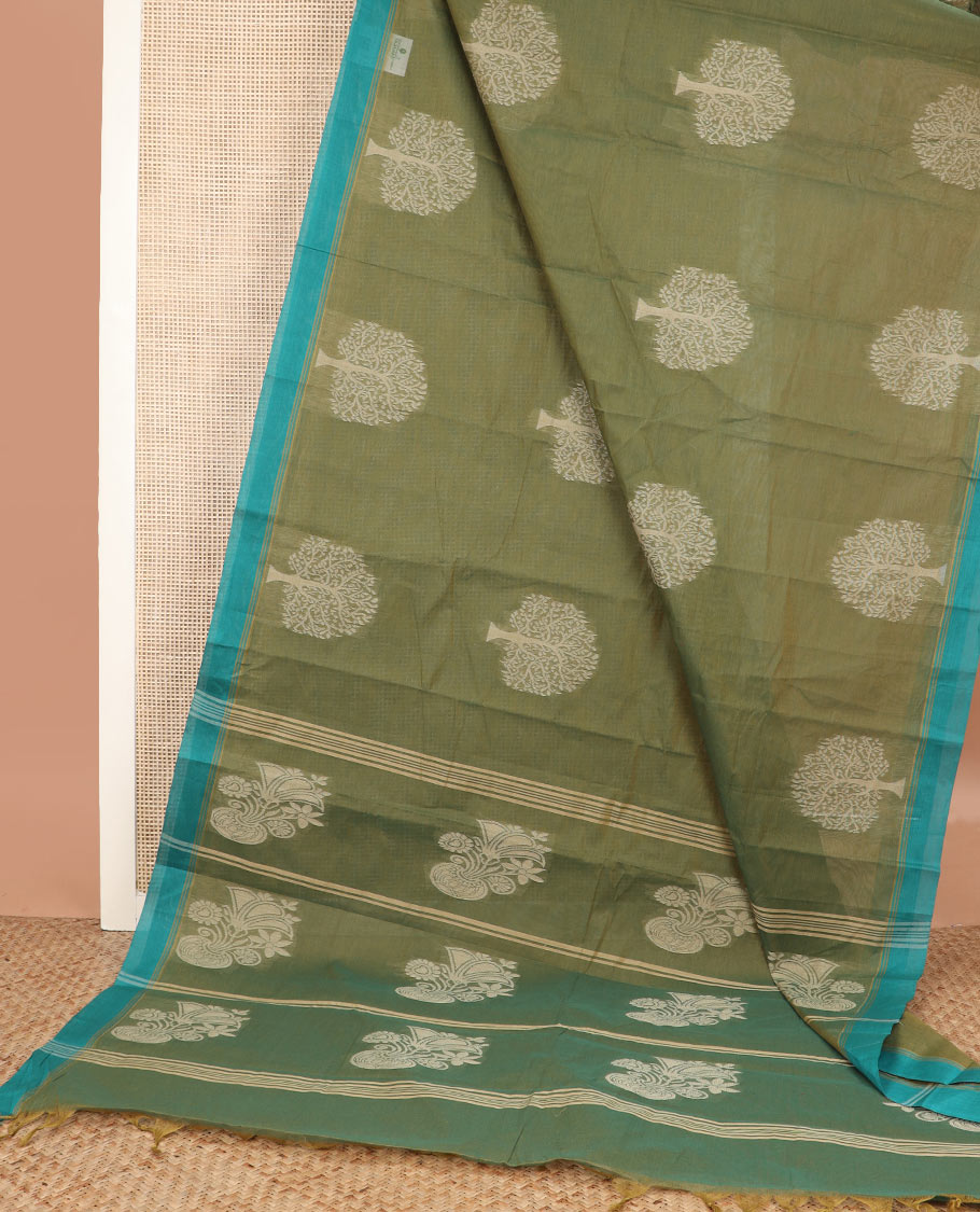 Green tree buttas kanchi cotton saree, contrast plain border, and floral potted pallu