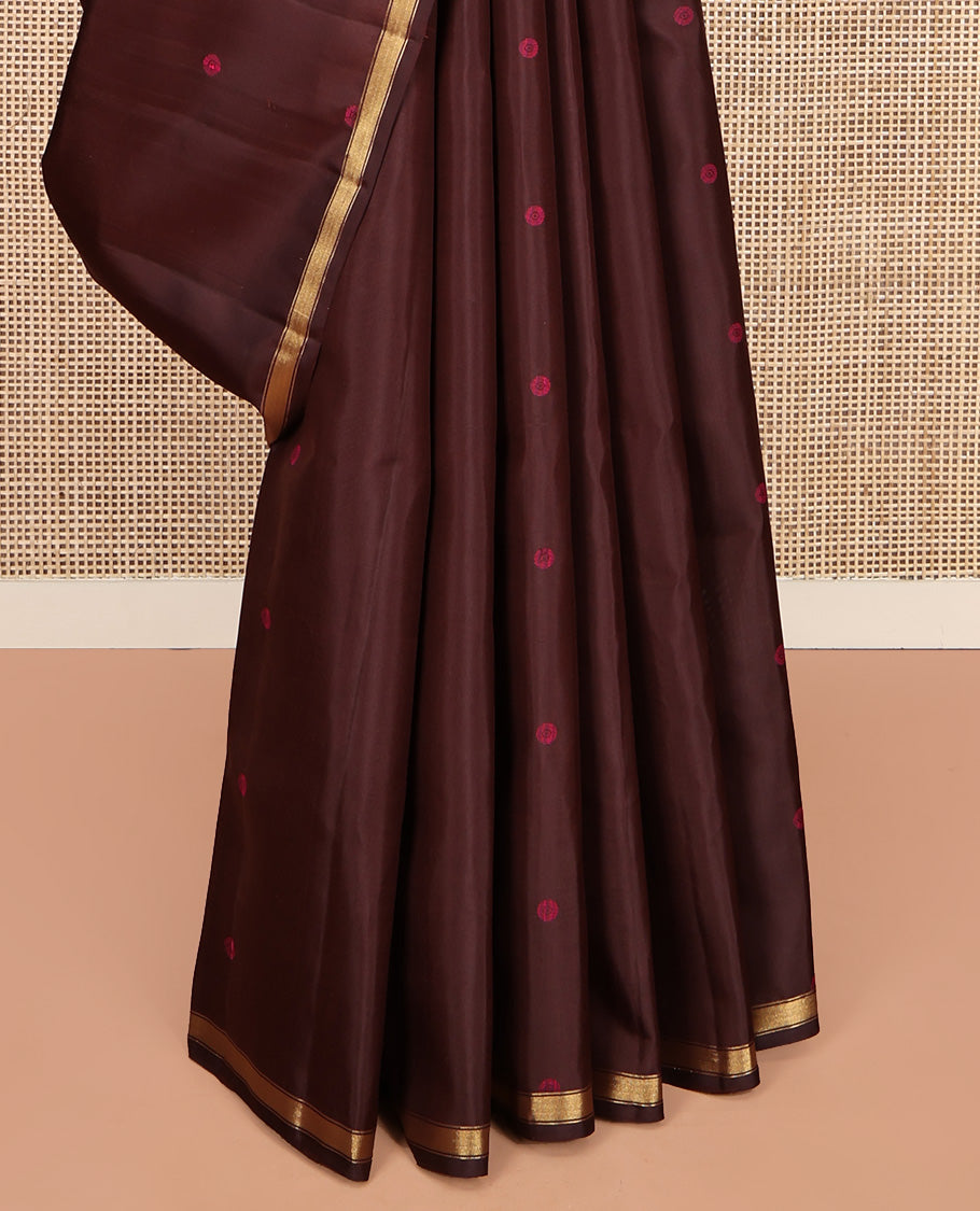 Brown Mayuri Soft Silk Saree, Subtly Woven with Buttas All Over Its Body, a Subtle Zari Piping Border, Pallu Steeped with Buttas, and Paired with a Matching Blouse