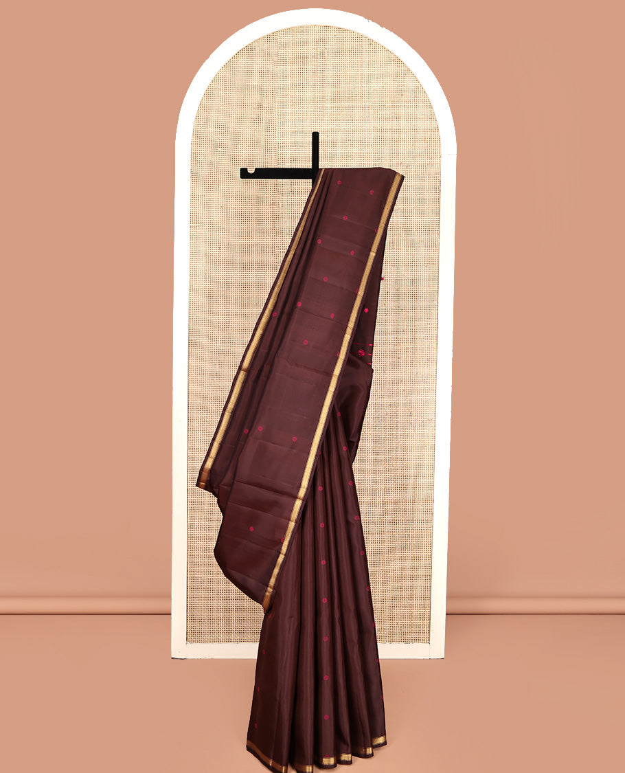 Brown Mayuri Soft Silk Saree, Subtly Woven with Buttas All Over Its Body, a Subtle Zari Piping Border, Pallu Steeped with Buttas, and Paired with a Matching Blouse