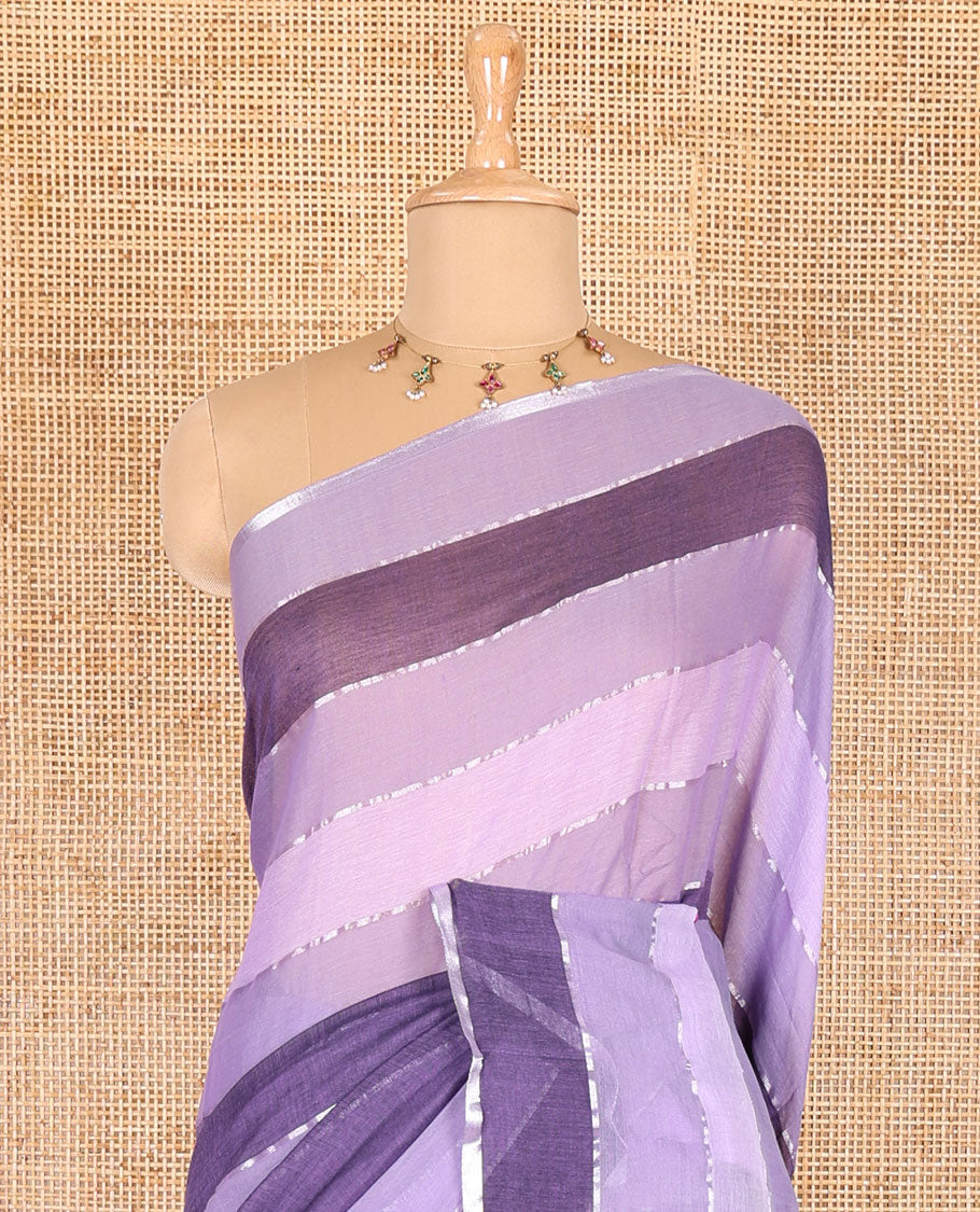 Violet ombre-colored striped khadi mul cotton saree, zari piping border, striped pallu, and a matching striped blouse