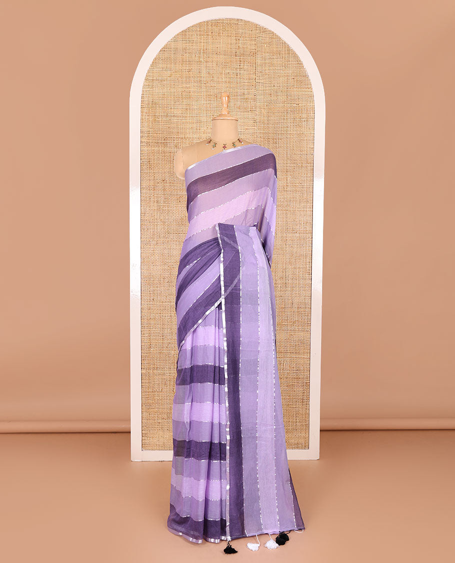 Violet ombre-colored striped khadi mul cotton saree, zari piping border, striped pallu, and a matching striped blouse