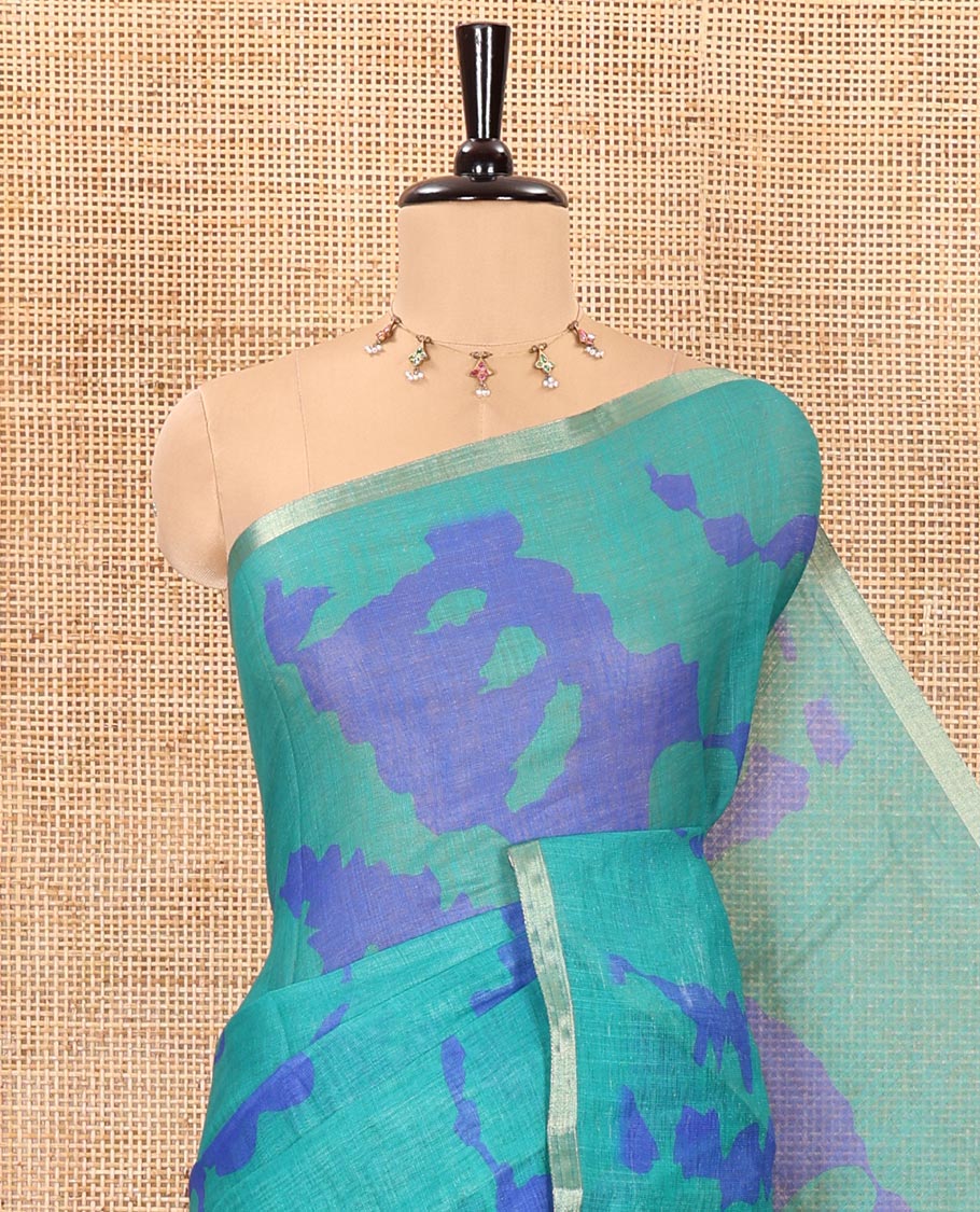 Bue shibori printed linen cotton saree, piping border, contrast floral printed pallu, and a contrast floral printed blouse