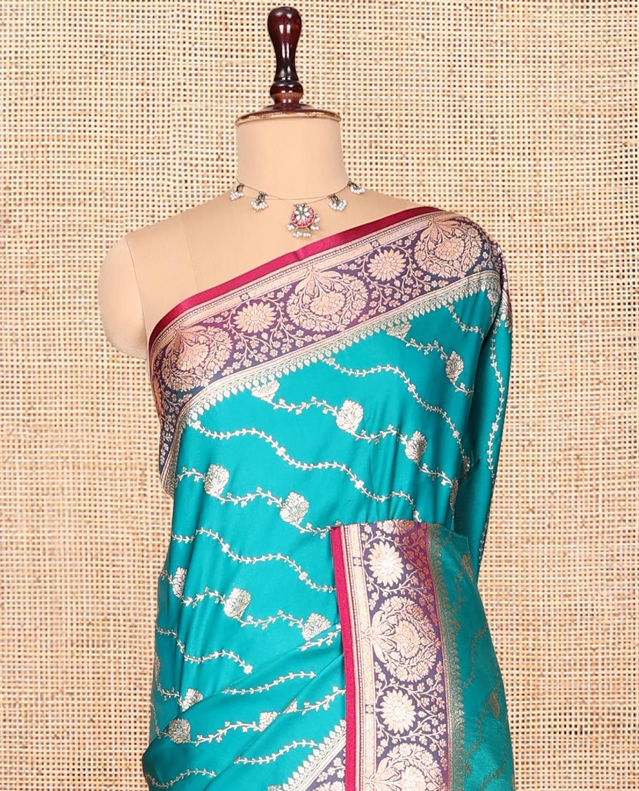 Green Banarasi Nylon Saree, Decked up with Buttas, Contrast Floral Creeper Zari Border, Intricate Pallu, and a Contrast Blouse