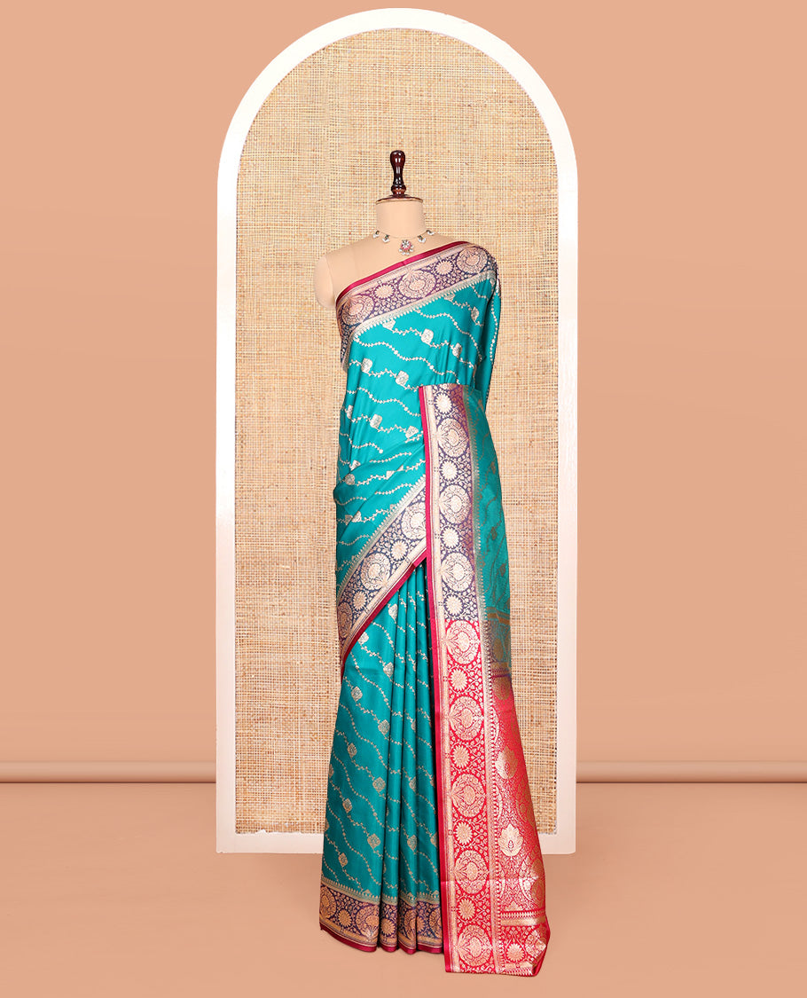 Green Banarasi Nylon Saree, Decked up with Buttas, Contrast Floral Creeper Zari Border, Intricate Pallu, and a Contrast Blouse