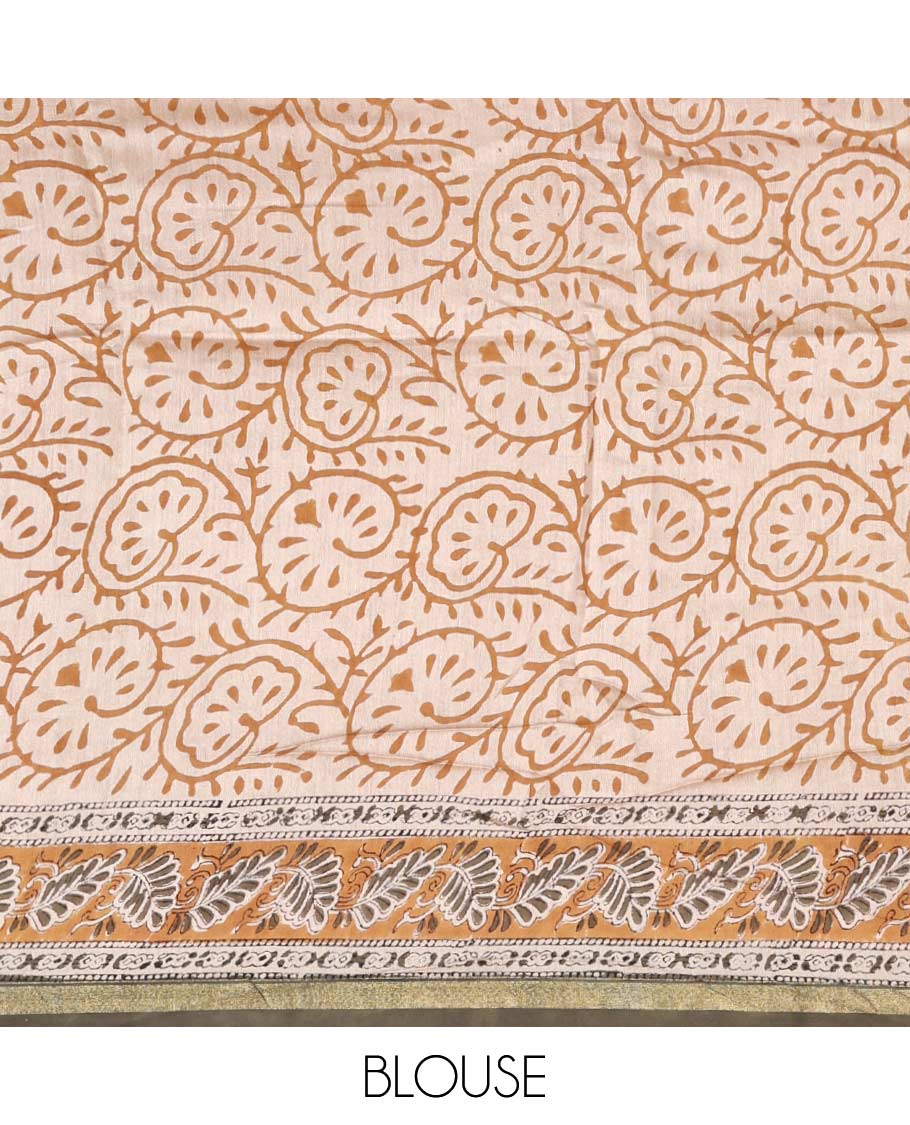 Cream floral printed mul mul cotton saree, contrast zari border, and pallu of intricate print