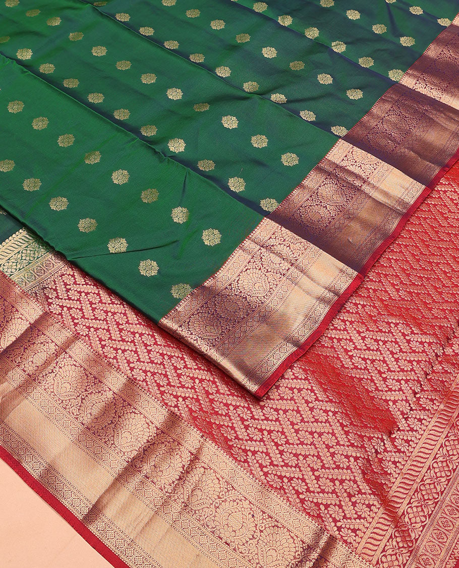 Green zari buttas Vasundhara silk mix saree, contrast border of thilakam, laddu kamalam, muthu, and kathir designs, and pallu of floral designs