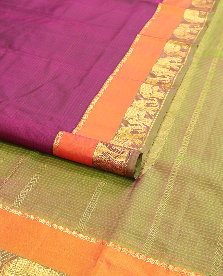 Purple striped kancheepuram silk saree with contrast border of thilakam mokku, yanaai design & zari design pallu