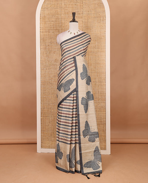 Green horizontal stripes printed soft tussar saree adorned with big butterfly motifs printed border and pallu, contrast blouse